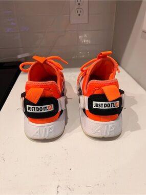 Nike Kids Sneakers in Bright Orange and White with 'Just Do It.' Heel Strap